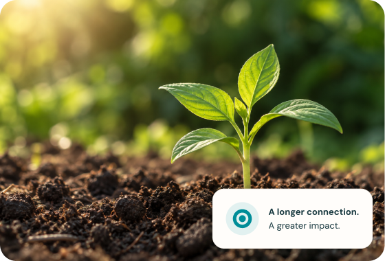 A young seedling growing from soil, with the message: A longer connection. A greater impact.